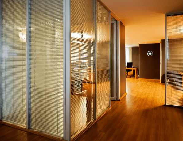 Innovative office space with unique partitioning and ceiling design that helps to transform the workspace.